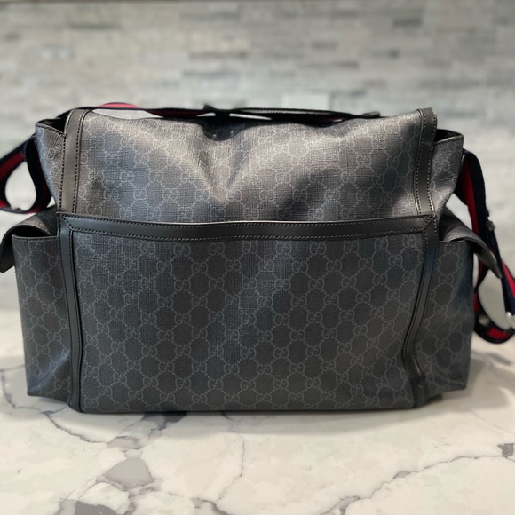 Black Gucci GG supreme diaper bag. Like new!